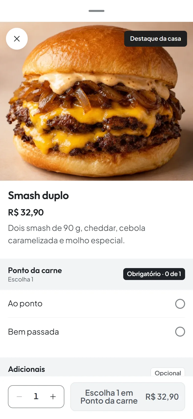 Ficha de um hambúrguer no cardápio: ponto da carne e adicionais com preço antes de colocar na sacola.